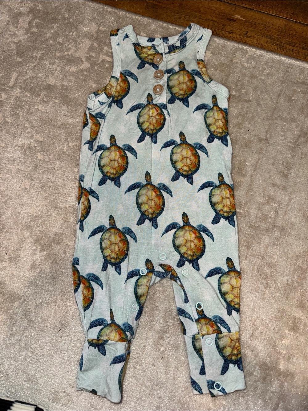 Posh Peanut Sea Turtle Print One-Piece Bodysuit in Light Blue, Navy & Gold